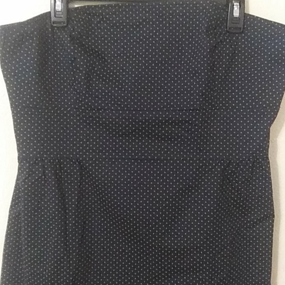 Strapless Dress is lined inside. It is a blue/dk green color w/ gold polkadots - Picture 3 of 4